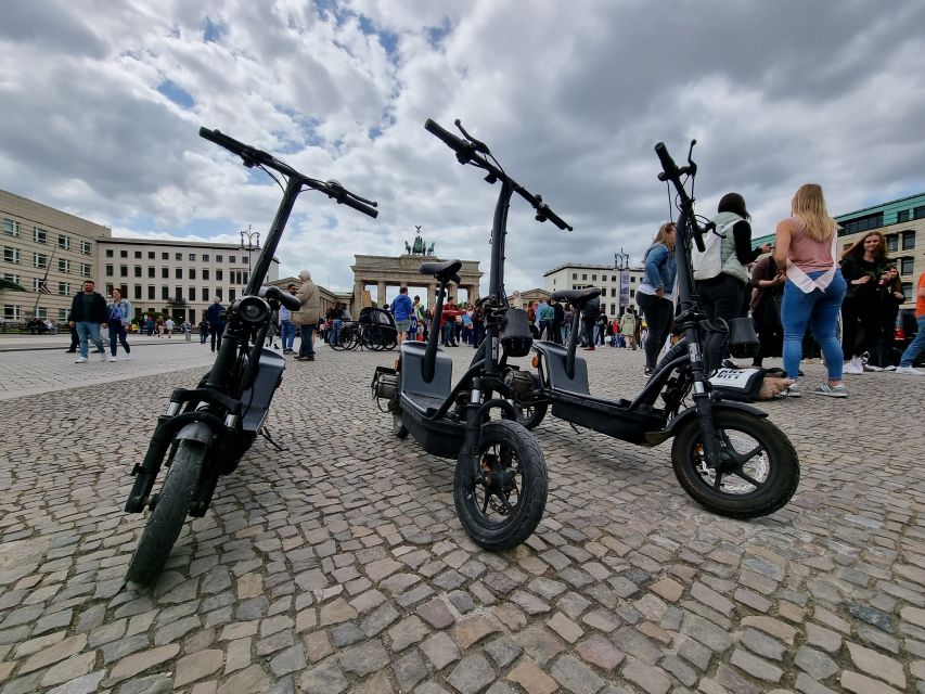 Berlin: 3-H Top Sights Guided E-Scooter Tour - Meeting point, helmet, and the scooter confidence step