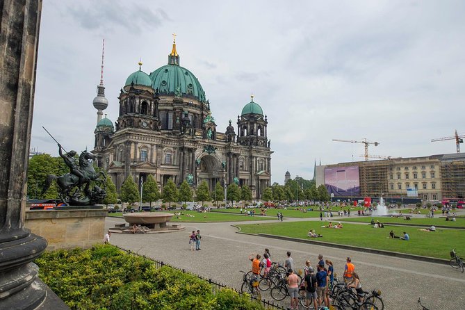 Berlin Highlights Sightseeing Bike Tour in Small Groups - Reichstag building and the Holocaust Memorial: history you feel, not just see