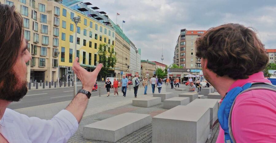 Berlin: Historical Sights & Berlin Wall Tour with a Berliner - Brandenburg Gate, from 28 years of isolation to reunified meaning