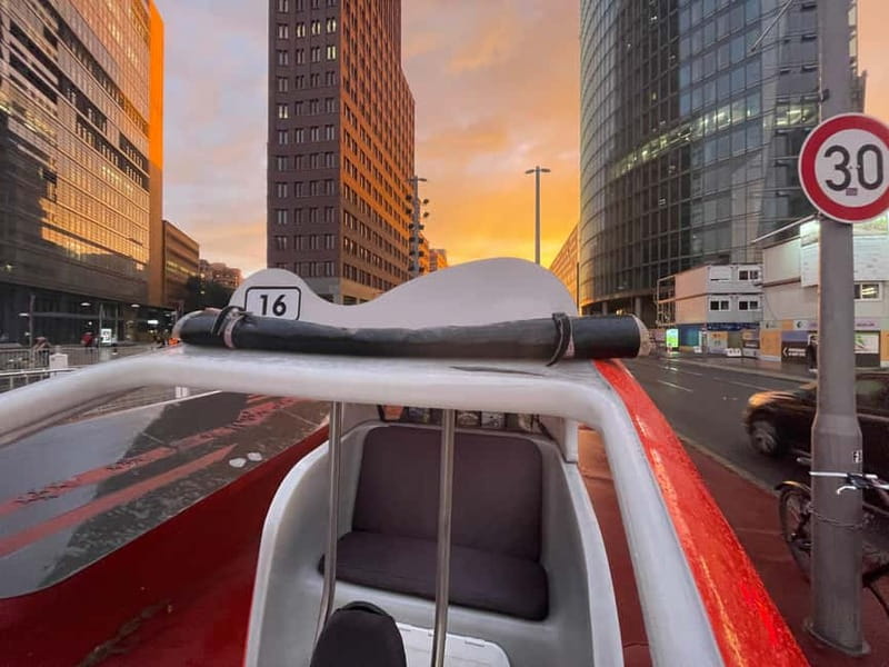 Berlin: Private Sightseeing Tour in an E-Rickshaw - Entering Berlin at the World Time Clock (Weltzeituhr)