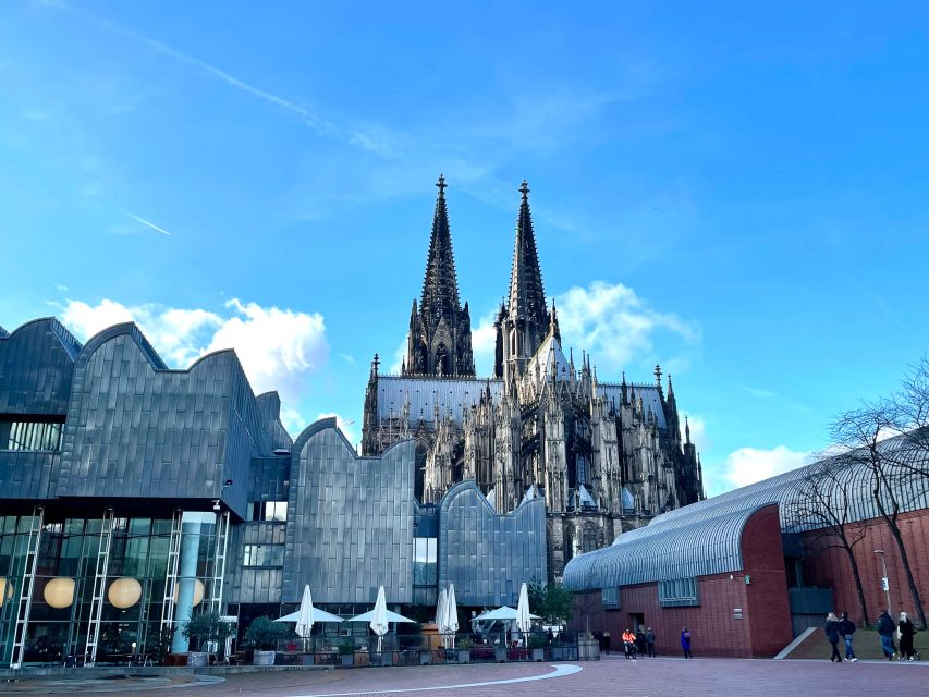 Cologne: City Highlights with Local Guide - Groß St. Martin and the power behind the streets