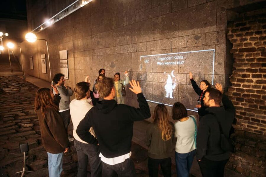 Cologne: Cologne Cathedral & Old Town in the evening – interactive tour with projector - Römische Hafenstraße start, Roman roots, and a tour that moves at walking speed