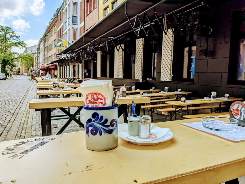 Düsseldorf: Tipping based - Old Town Walking Tour - Düsseldorf origins and the market atmosphere you can feel