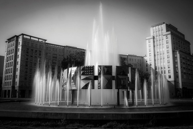 East Berlin: City of Shadows Walking Tour - Meeting at Unter den Linden 42, then stepping into Brandenburg Gate history