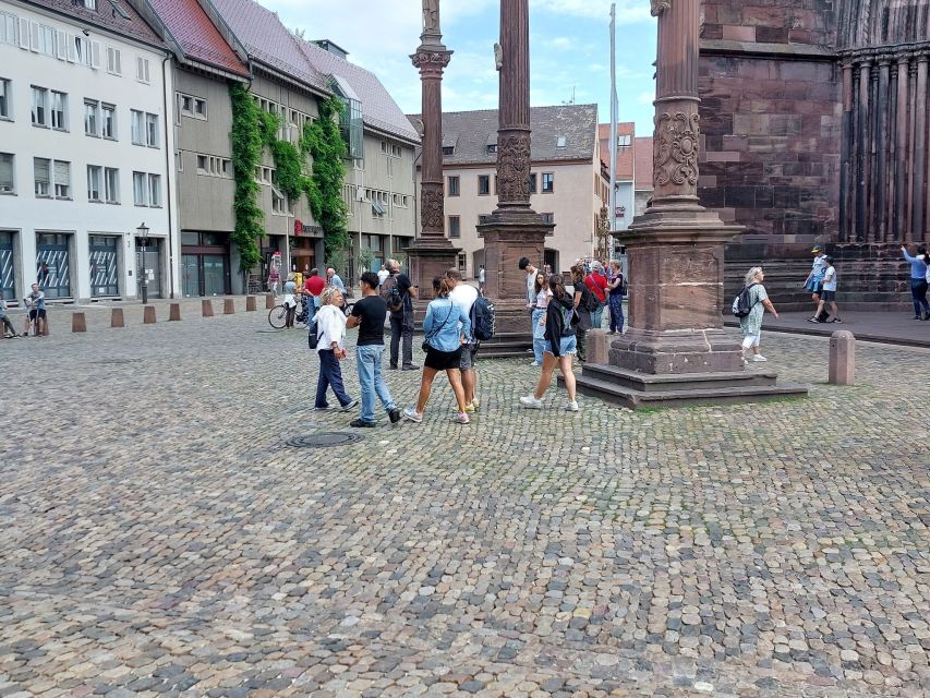 Freiburg: Walking and Strolling the Historic Center - Schwabentor and St. Martin’s Tor: gates with legends behind the paintings