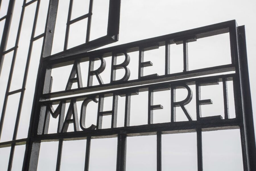 From Munich: Dachau Memorial Site Day Tour - Seeing Dachau’s camp areas: barracks, cells, and the gas chamber
