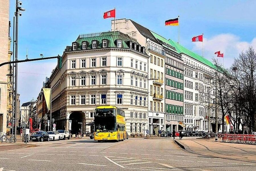 Hamburg: Hop-On Hop-Off Bus Tour Yellow Double Decker - Speicherstadt and the Alster edge: canals, warehouses, and breathing room