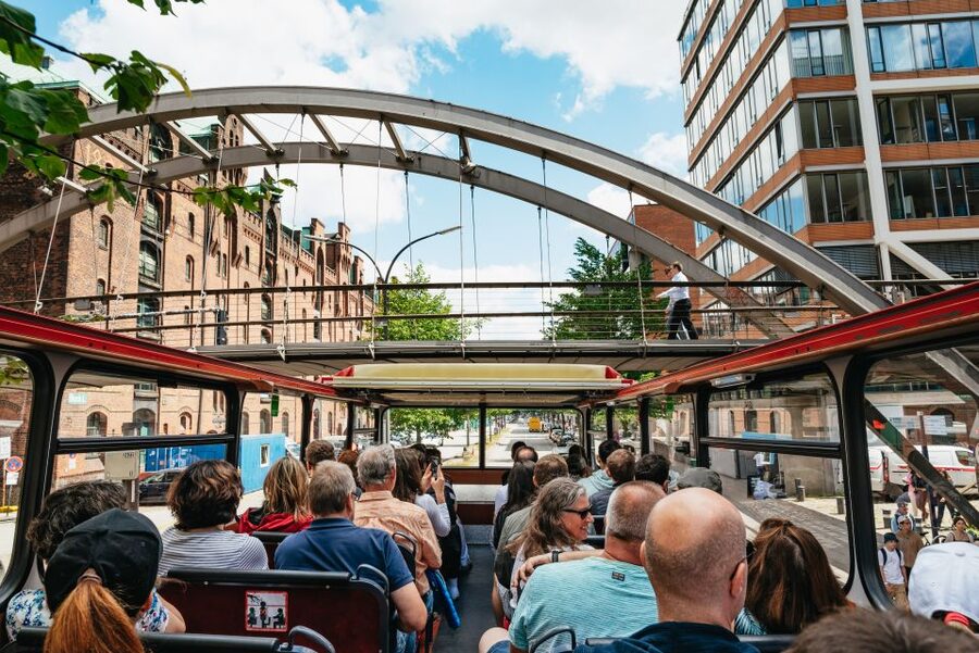 Hamburg: Hop-On Hop-Off Bus with Harbor Cruise - Audio guides and headphones: 11 languages on the bus, GPS control, and small language quirks