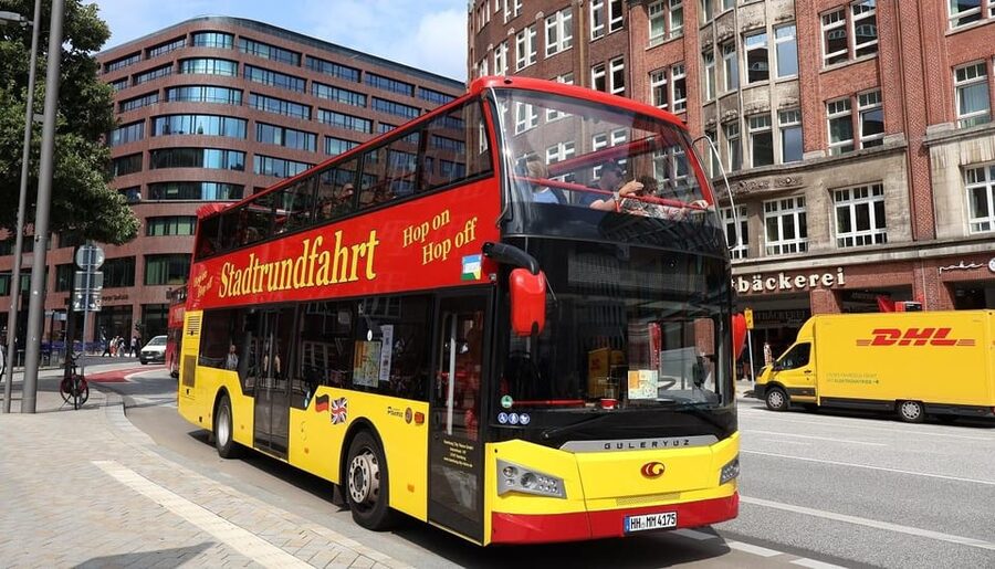 Hamburg: Line C Sightseeing Hop-On Hop-Off Bus Tour - First ride impressions: the yellow and red double-decker and the open roof