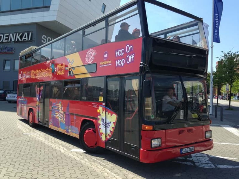 Kiel: City Sightseeing Hop-On Hop-Off Bus Tour - Audio guide tips: getting value from headphones and the German live commentary