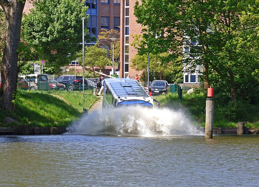 Lübeck: 1-Hour Splash Bus City Tour - From the Water: Seven Towers, Holsten Gate, Bridges, and the Gardens
