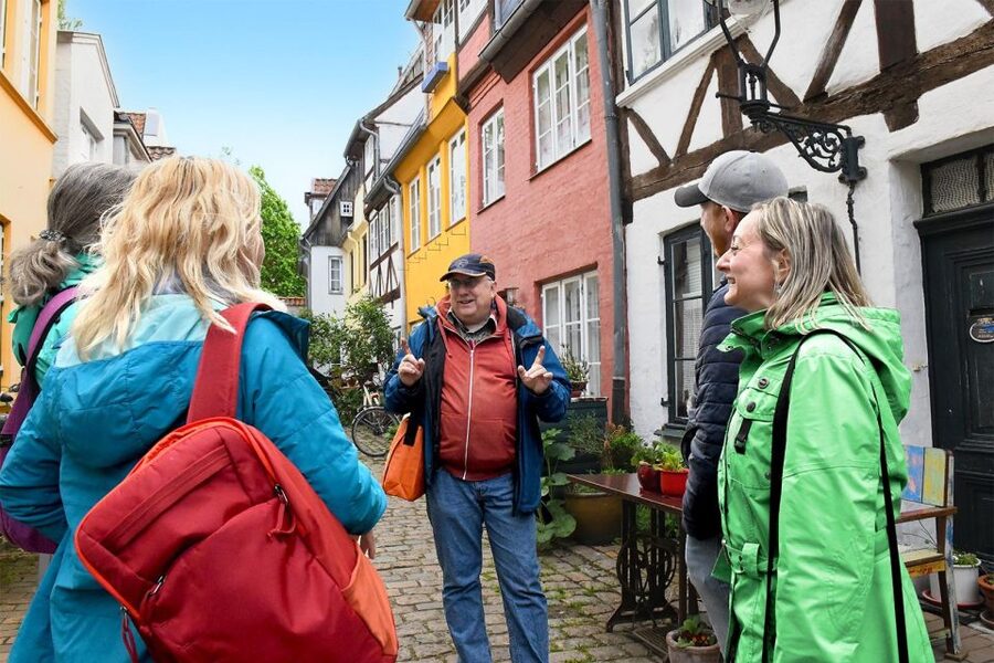 Lübeck: entertaining guided tour to old town highlights - Where the tour begins: Holstentor and the view that sets the mood