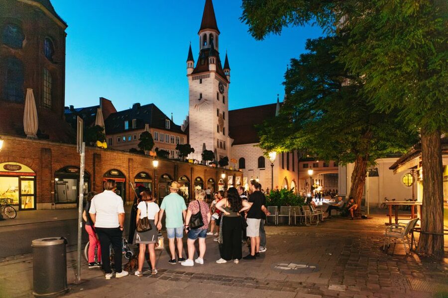 Munich: Middle Ages Tour with Night Watchman - Talburg Gate: closing time and the halberd moment