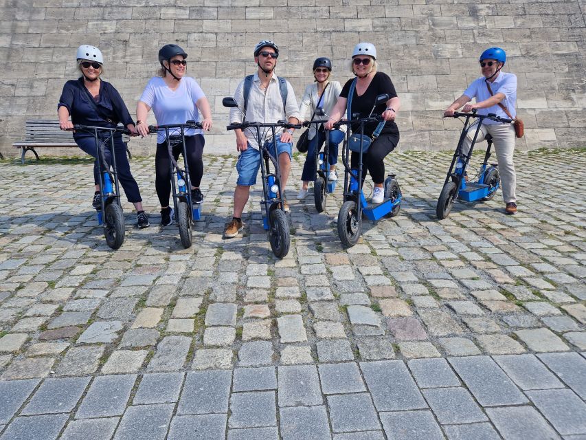 Munich: Top Sights Guided E-Scooter Tour - Frauenkirche, Theatinerkirche, and church stops that add contrast