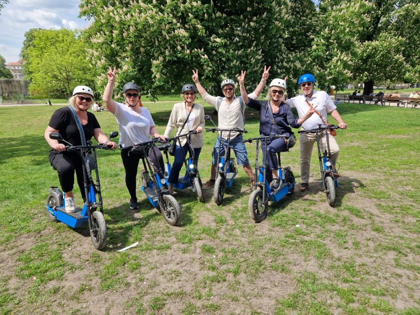 Munich: Top Sights Guided E-Scooter Tour - English Garden, Chinesischer Turm, Biergarten views, and Friedensengel
