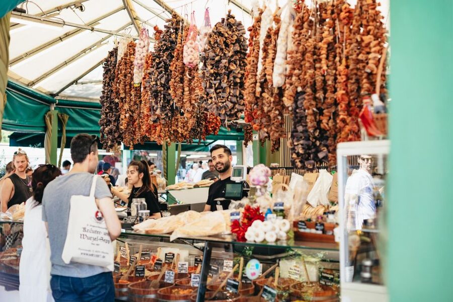 Munich: Viktualienmarkt Food Tour - International dishes and exotic fruit, for that Munich today feeling