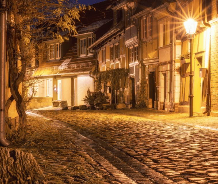 Night Watchman Tour through Quedlinburg - Market Square Meet-Up: Finding the City Info With the Green Sign