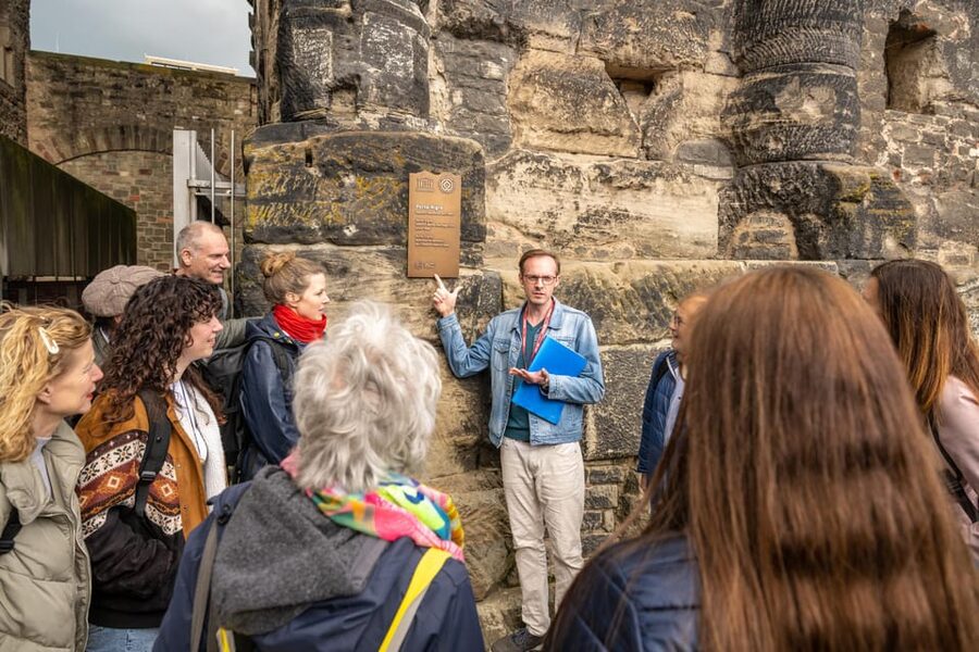 Trier: City Walking Tour - Dreikönigenhaus, Judengasse, and the Middle Ages power struggle at street level